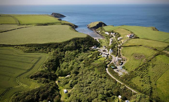 Sheltered pitches just yards from the sea